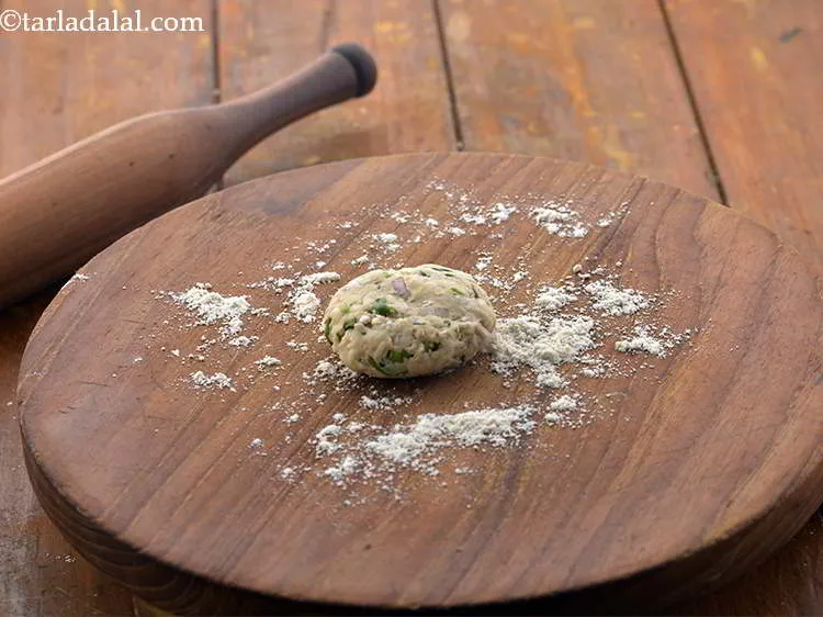 Step 15 – <p>Take a portion of the dough and flatten it.</p>