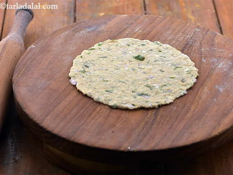 Step 16 – <p>Roll out each portion of&nbsp;<strong>Oats Roti</strong>&nbsp;into a 125 mm. (5") diameter circle using a little …