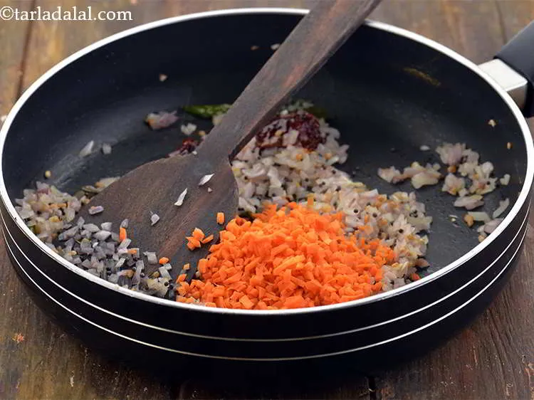 Step 14 – Add the carrots. I love adding French beans, tomatoes and boiled corn in the <strong>Oats …