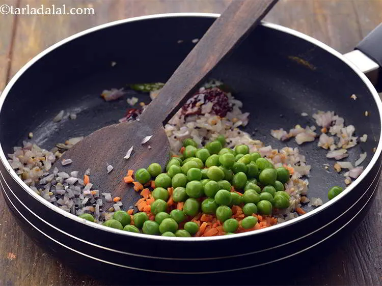 Step 15 – Add the green peas. You can add any vegetable of your choice to give a …
