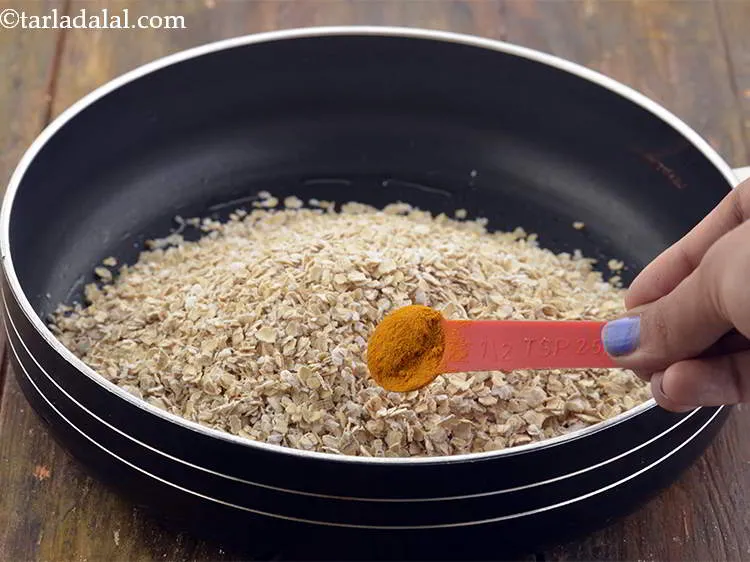 Step 4 – Add &frac12; tsp of turmeric powder.