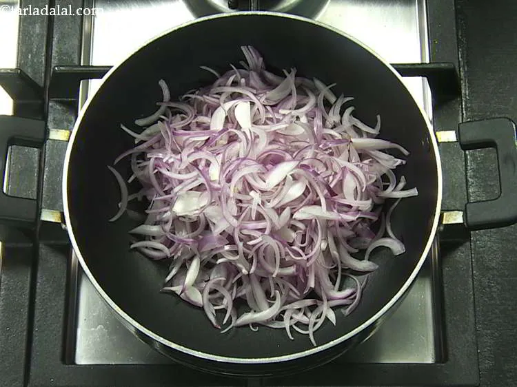 Step 9 – Add the onions and saut&eacute; on a medium flame for 1 to 2 minutes.