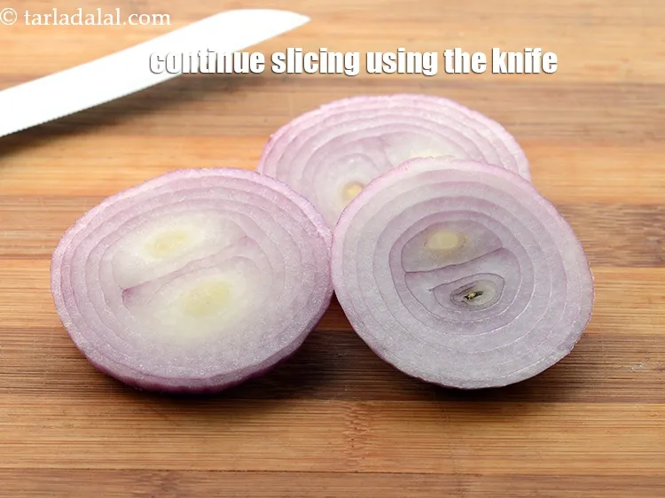 Step 17 – Continue slicing using the knife across the chopping board to get more round onion slices. …