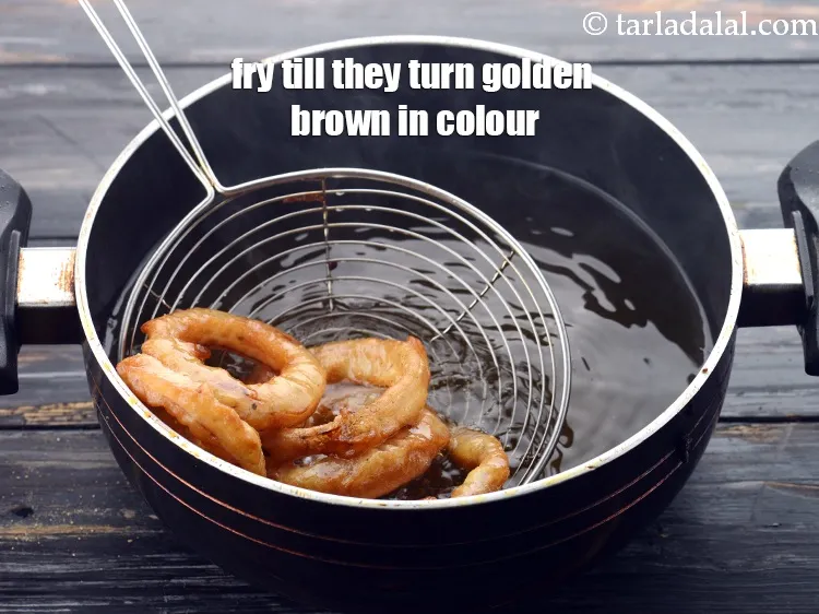 Step 23 – Deep-fry in hot oil on a medium flame. Turn in between and fry till they …