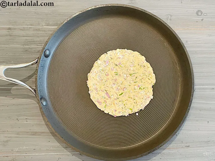 Step 16 – Heat a non-stick tava (griddle) and cook one side without oil for &nbsp;30 seconds.&nbsp;