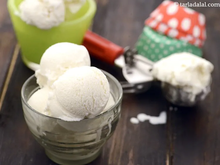 Step 4 – Then to make <strong>papaya orange smoothie</strong>, add vanilla ice-cream also to the mixer jar.