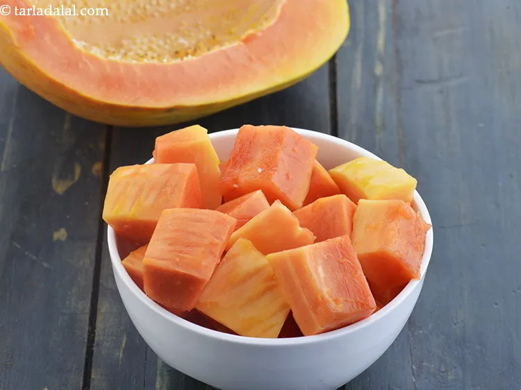 Step 3 – Next make cubes of chilled papaya also and add them to them to the mixer …