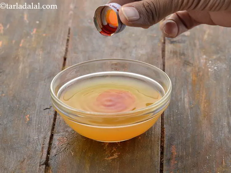 Step 4 – Add the orange colour. Use only branded and good quality food colouring.