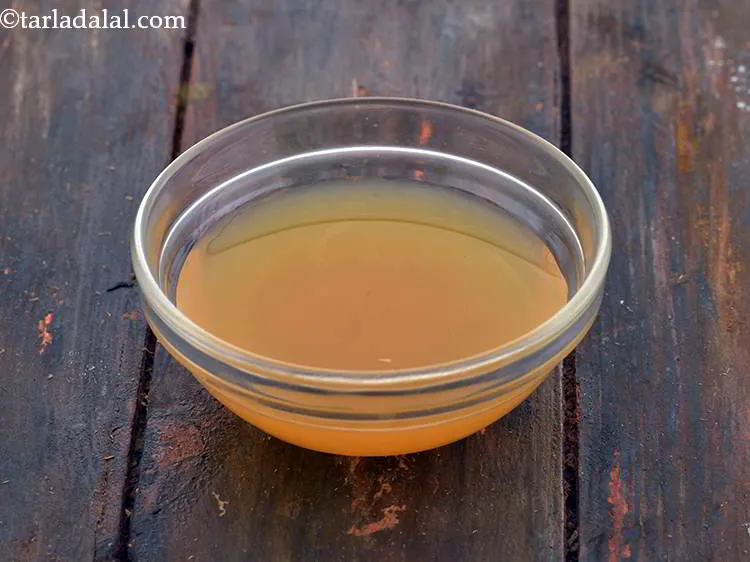 Step 2 – To make the <strong>Orange Glaze Icing</strong>, take a small bowl and add the orange juice …