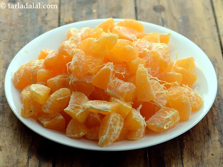 Step 16 – As soon as you peel them, the orange pieces will start loosening. Separate the orange …