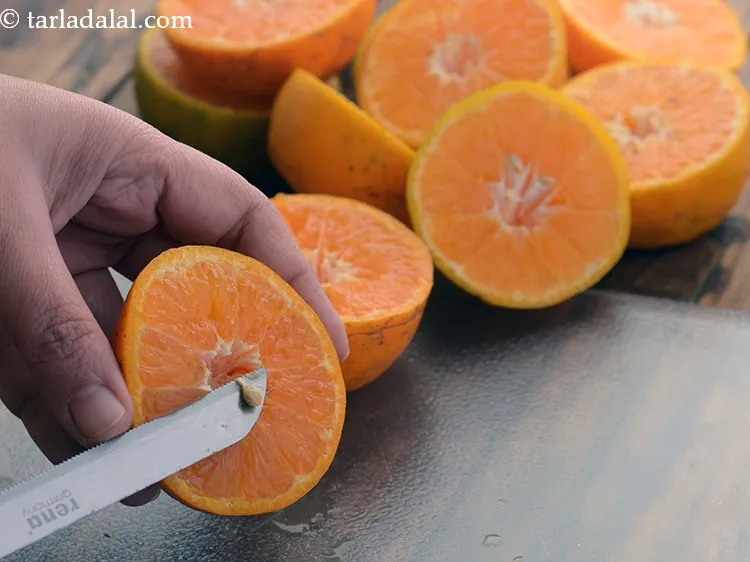 Step 14 – Now using a fork or the back of a spoon or a knife deseed the …