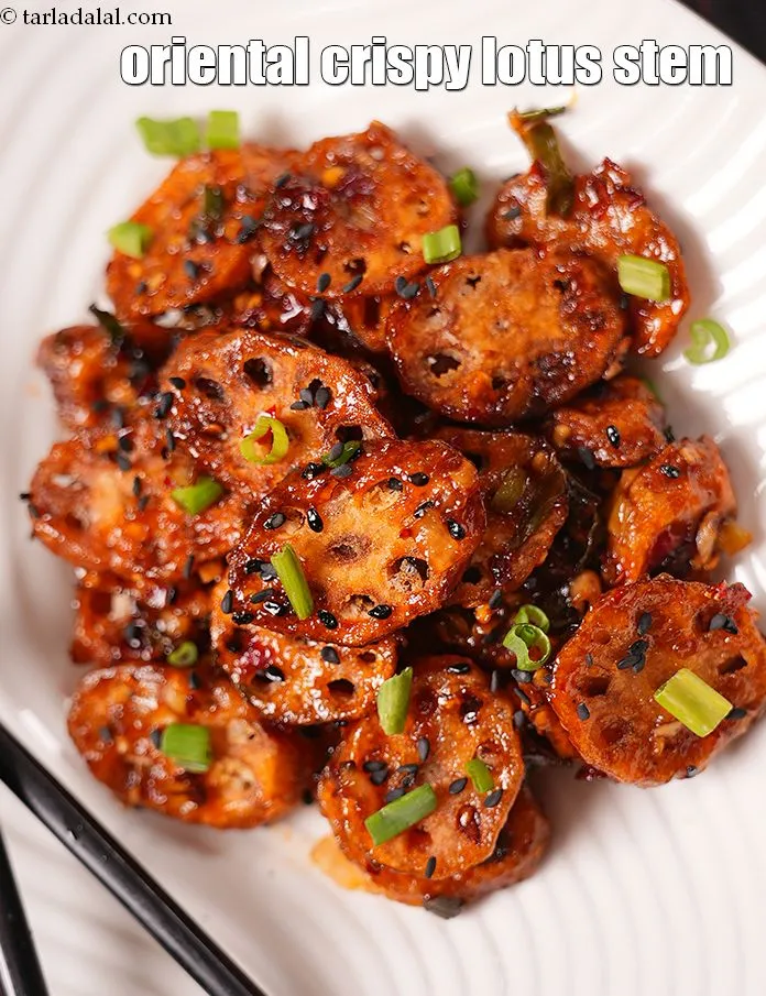 Step 26 – Serve <strong>honey chilli lotus stem recipe</strong> immediately garnished with black sesame seeds and spring onion …