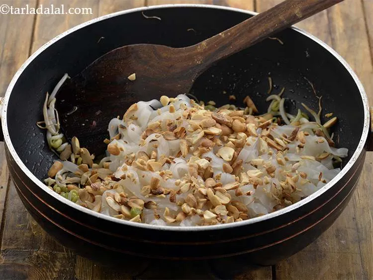 Step 12 – Add the peanuts. This gives a very nice crunch to the recipe.&nbsp;