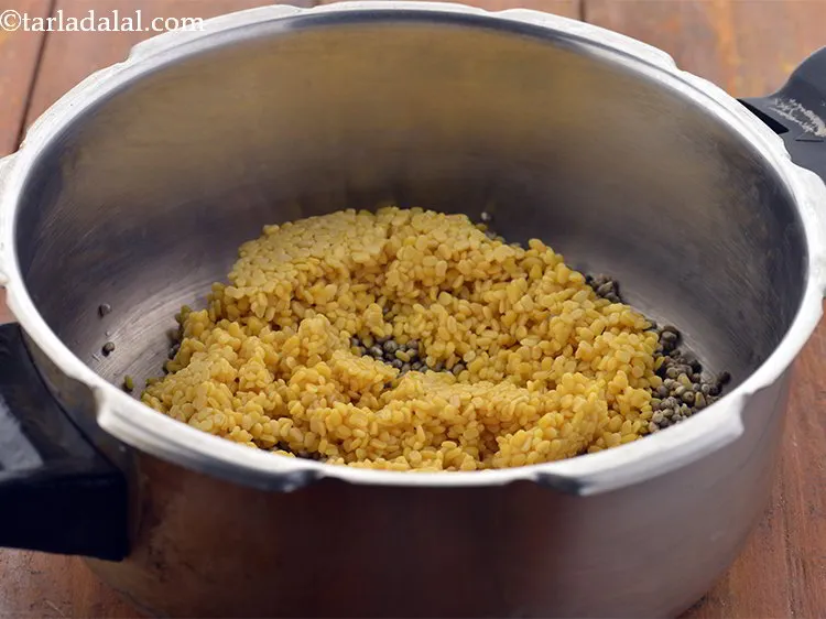 Step 10 – Add the <em>moong dal</em>.