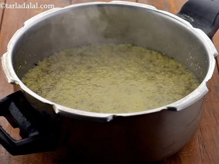 Step 14 – For the&nbsp;<strong>palak bajra khichdi recipe | bajra moong dal khichdi | healthy bajra khichdi |&nbsp;</strong>in …