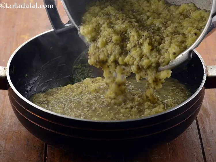 Step 20 – Add the cooked bajra-yellow moong dal mixture