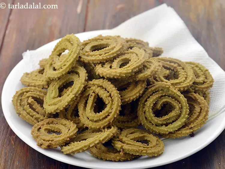 Step 23 – Heat the oil in a deep non-stick pan, deep fry a few chaklis at a …