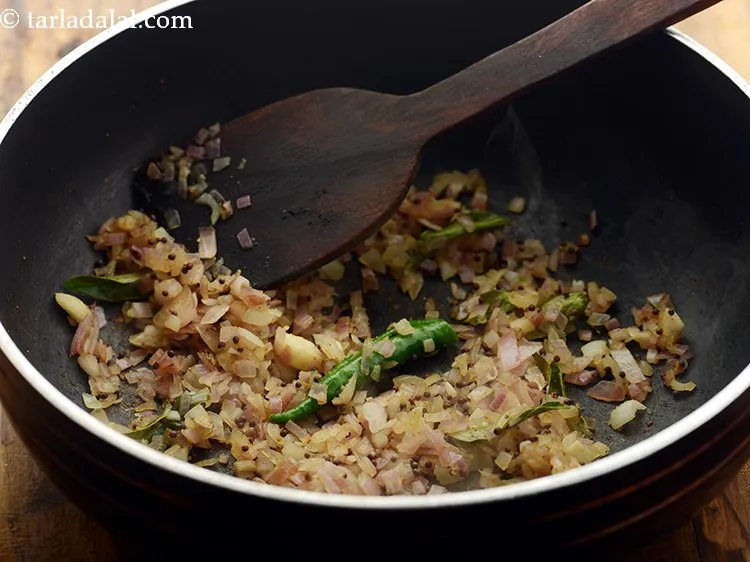 Step 16 – Dry roast till they turn light brown in colour. Sprinkle a little water if the …