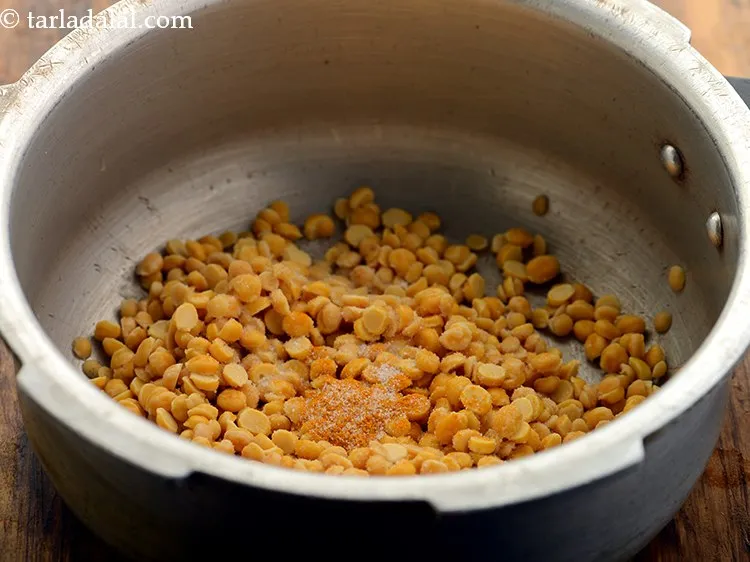Step 8 – Add salt and turmeric powder.