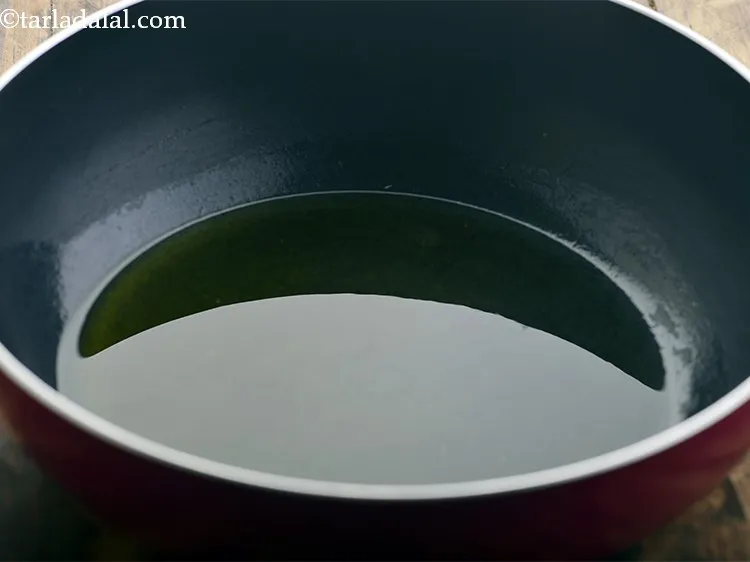 Step 17 – For an added flavour, we will temper the&nbsp;<strong>palak khichdi | palak dal&nbsp;khichdi |</strong>&nbsp;Heat 2 tbsp …