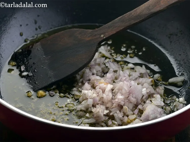 Step 20 – Add the onions.