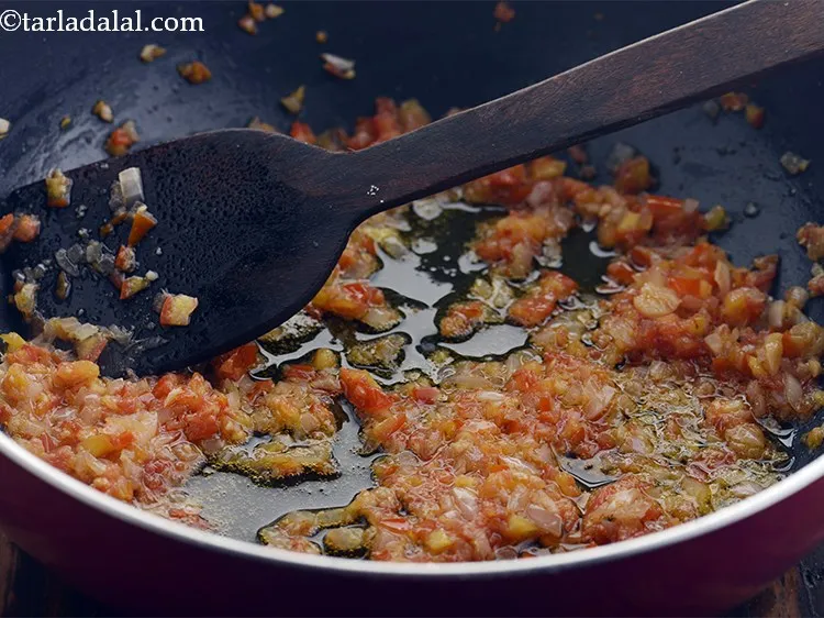 Step 22 – Mix well and cook on a medium flame for 3 minutes ,while stirring occasionally.