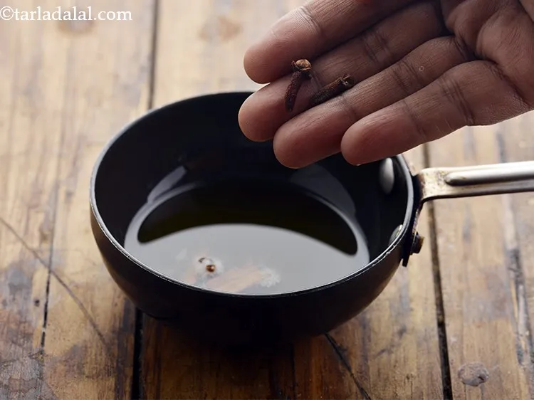 Step 32 – Add cloves.