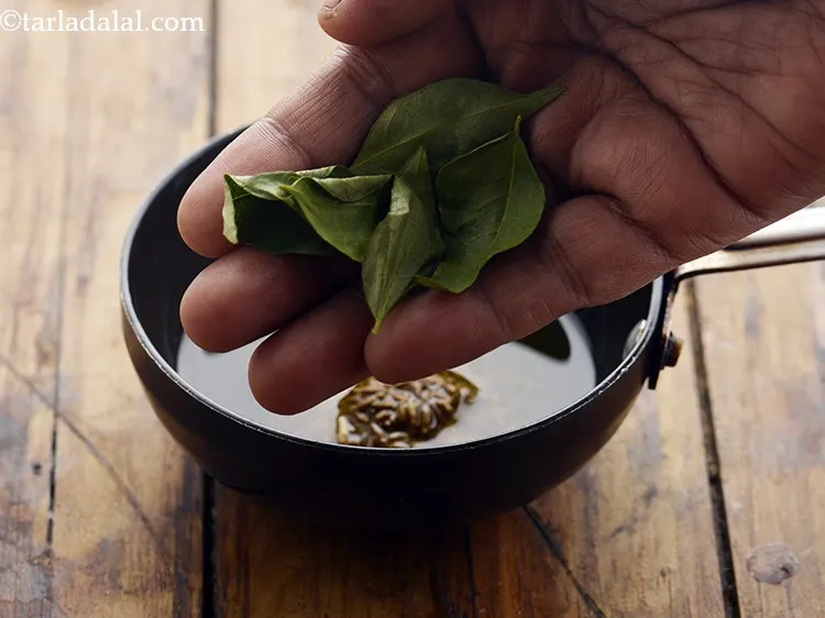 Step 35 – Add curry leaves. These are optional.