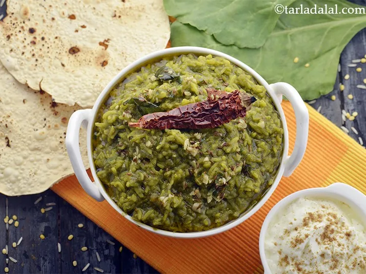 Step 41 – Serve the<strong> Palak Khichdi</strong> hot with curds and papad.
