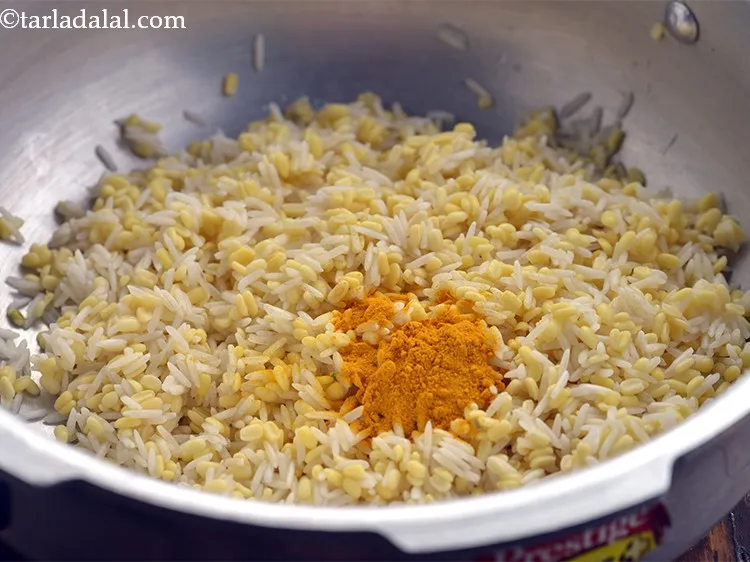 Step 12 – Add turmeric powder.