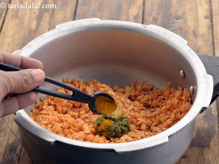 Step 8 – Add turmeric powder.