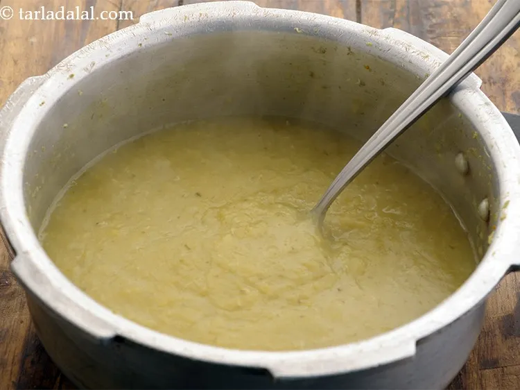 Step 10 – Pressure cook for 2 whistles. Allow the steam to escape before opening the lid.