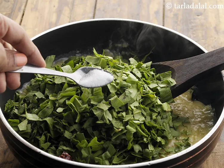 Step 19 – Add 1 cup of water, spinach and salt. Spinach has a naturally salty flavour so …