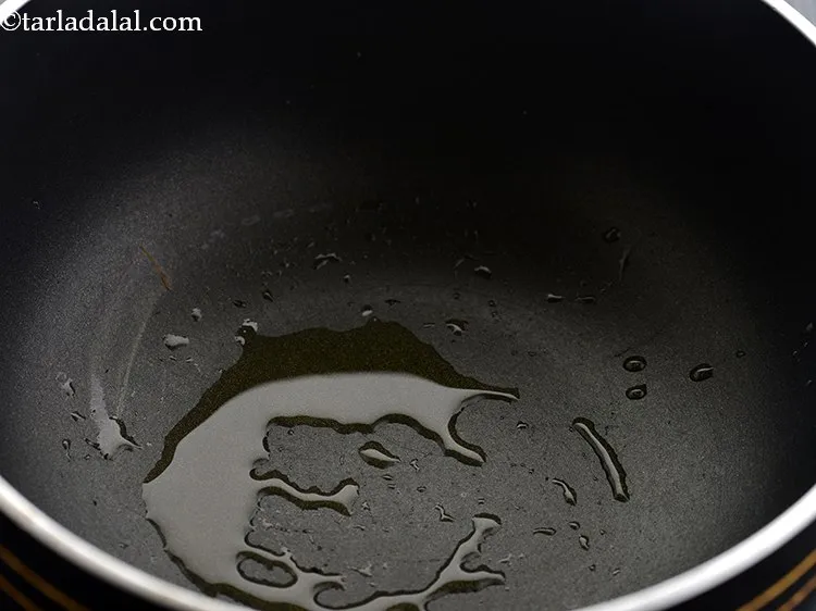Step 20 – Now to temper <strong>Palak Masoor Dal for Infants and Toddler,</strong> heat &frac12; tsp of ghee …