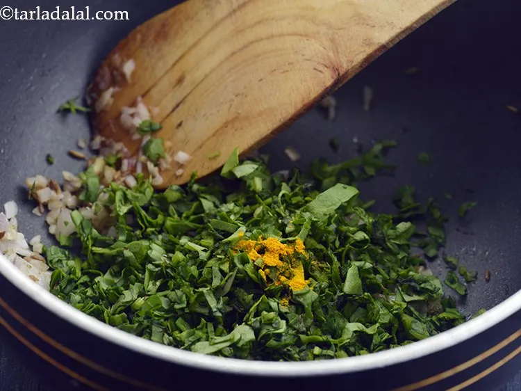 Step 26 – Now add some spice. First add the turmeric powder. This serves the purpose of colour …