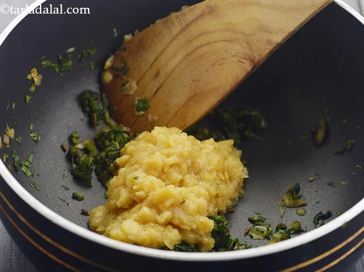 Step 30 – Add the cooked dal from the pressure cooker into the deep pan.&nbsp;