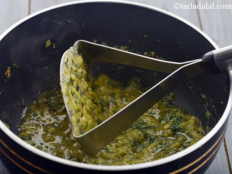 Step 31 – Mix well and mash it once using a potato masher. This is especially needed if …