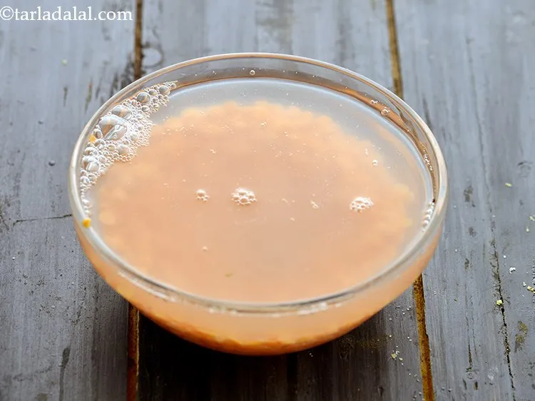 Step 14 – Add enough water to masoor dal. Cover with a lid and keep aside to soak …