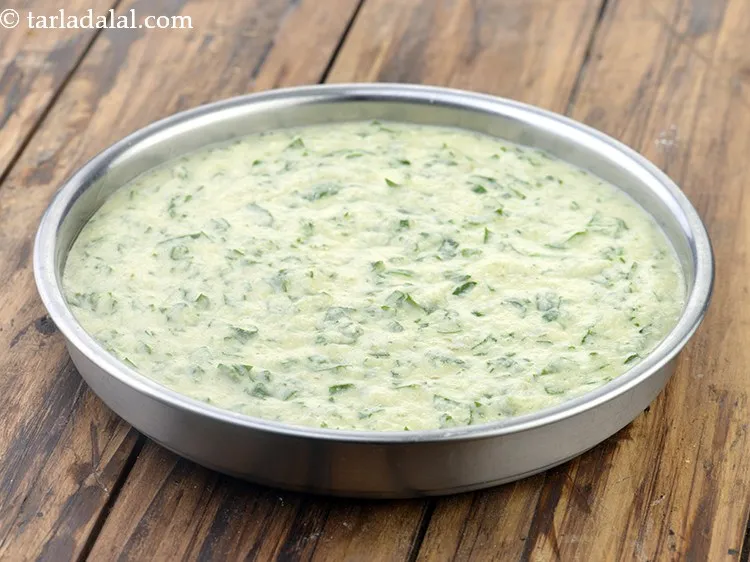 Step 20 – Pour half the batter immediately into a greased 175 mm. (7&quot;) diameter thali and shake …