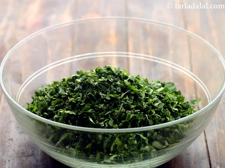 Step 4 – Transfer the spinach and fenugreek leaves to a plate or a bowl.