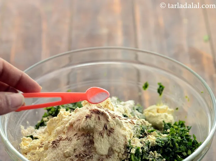 Step 14 – Add 2&nbsp;pinches of&nbsp;<a href="https://www.tarladalal.com/glossary-baking-soda-soda-bi-carb-615i">baking soda</a>.