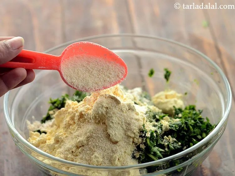 Step 12 – Add 1 tbsp&nbsp;<a href="https://www.tarladalal.com/glossary-semolina-sooji-rava-rawa-603i">semolina (rava / sooji)</a>&nbsp;to provide the palak methi muthiyas with a nice …