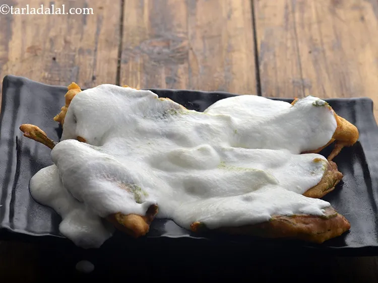 Step 17 – Spread 1/4 cup of whisked curd.&nbsp;