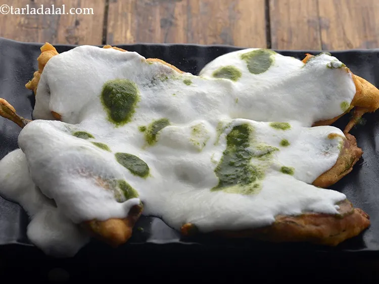 Step 18 – Top with 1/2 tbsp of teekha chutney.