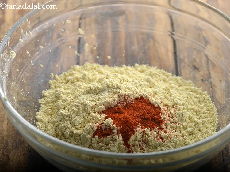 Step 6 – Add the chilli powder. To make it spicier, increase the amount.