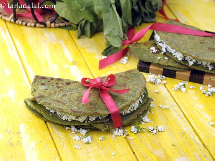 Step 15 – Since very little oil is used to grease the tava before cooking the paratha, we …