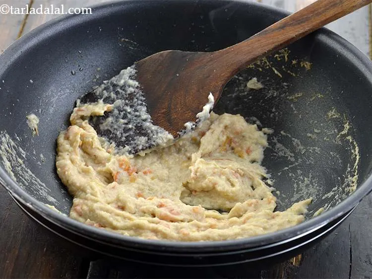 Step 22 – Now add the onion-cashew paste and cook for about 3-4 minutes.