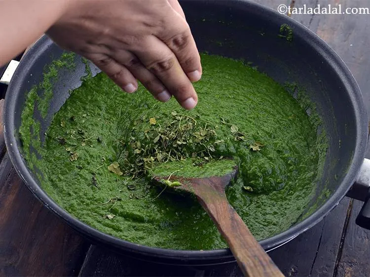 Step 27 – Now add the dried fenugreek leaves. Always crush the fenugreek leaves before you add them …
