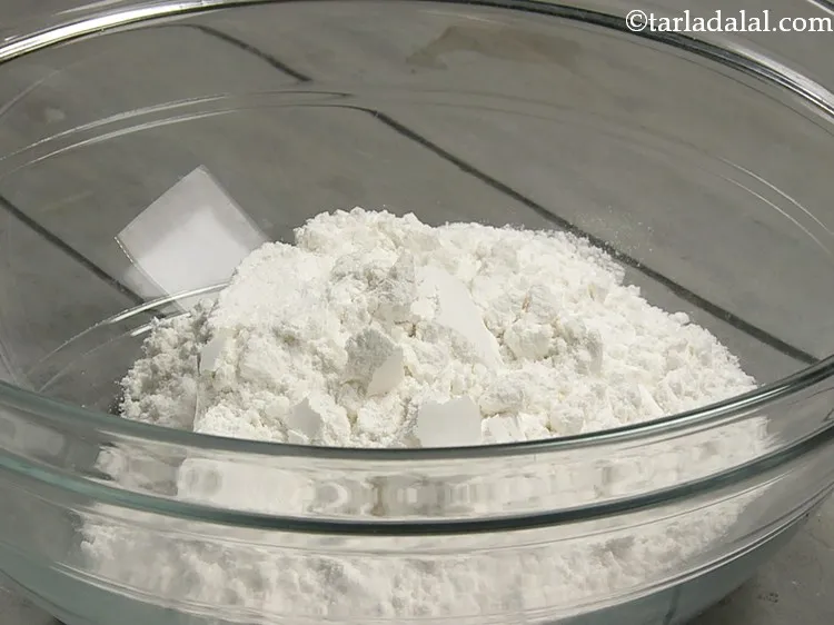 Step 15 – For preparing the dough for <strong>spinach mint sev</strong>, in a deep bowl, take rice flour. …