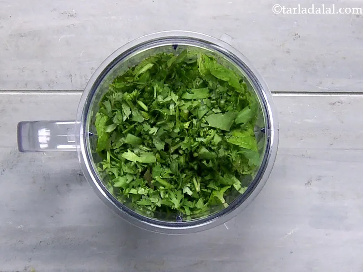 Step 9 – Add the roughly chopped coriander.